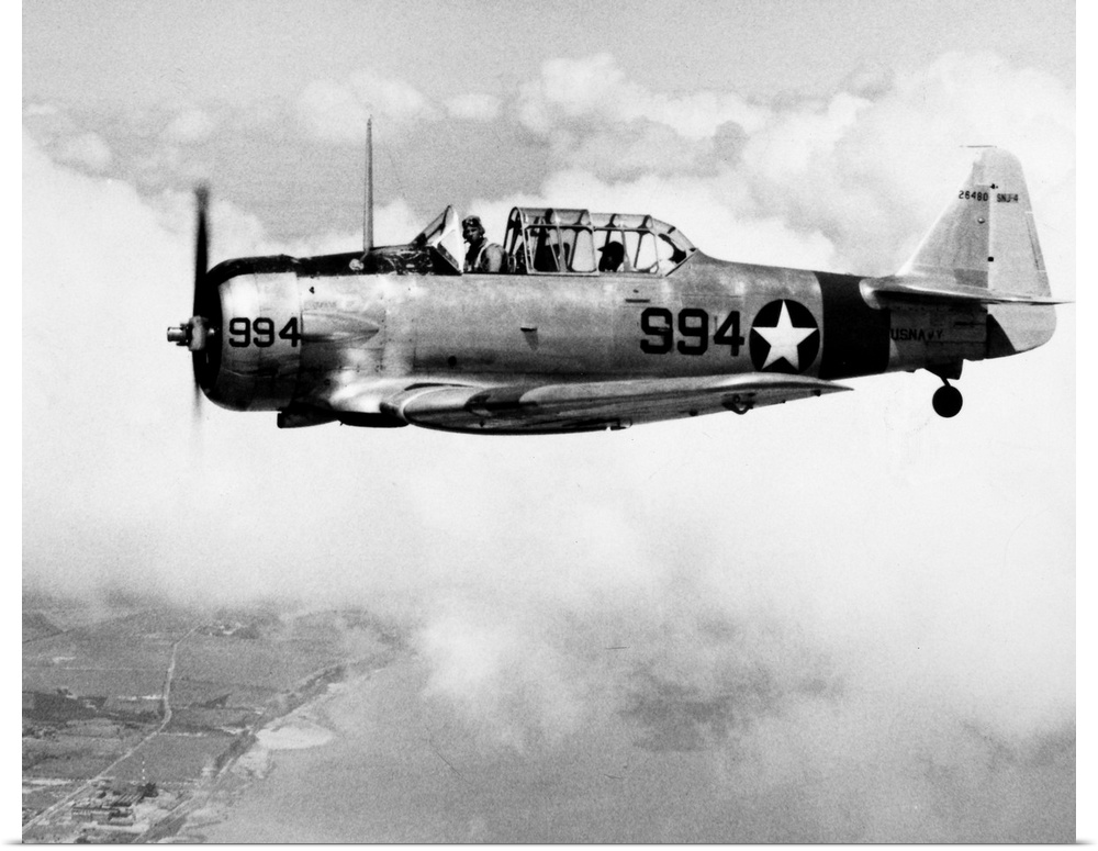 The T-6 Texan, a training plane for the U.S. Navy over the Gulf of Mexico, 1943.