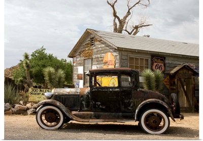 An old automobile in front of the Hackberry General Store along Route 66,  Arizona