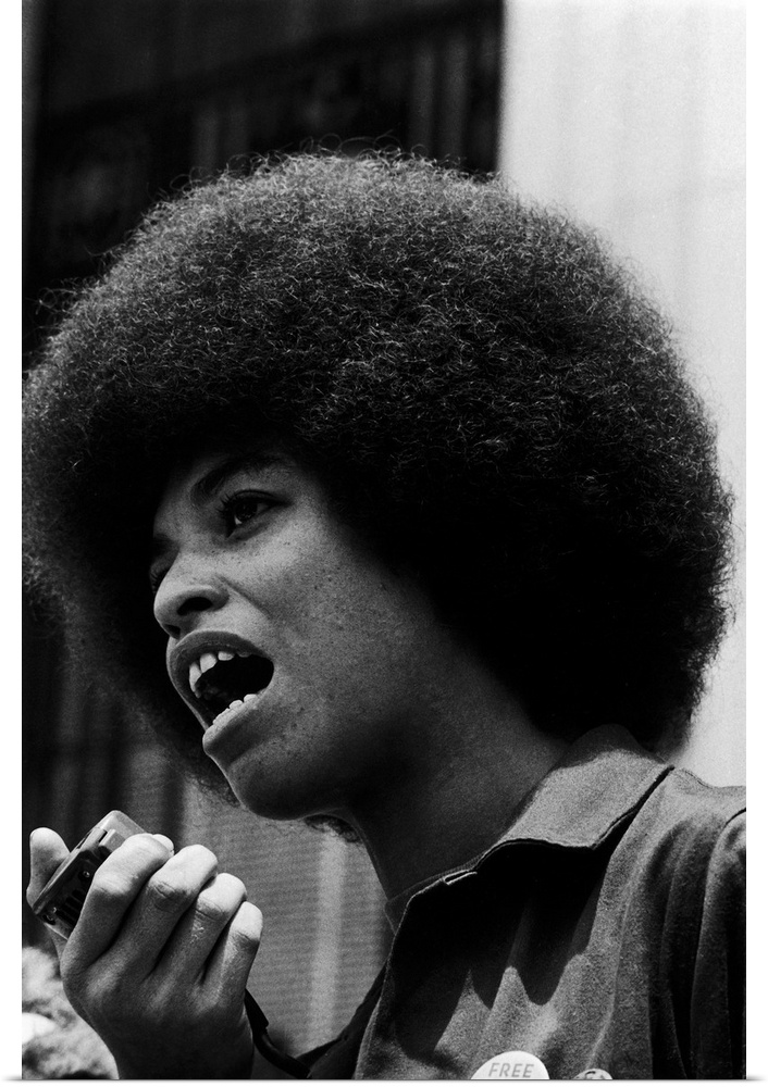 ANGELA DAVIS (1944- ). American political activist. Speaking to the press at the University of California at Los Angeles, ...