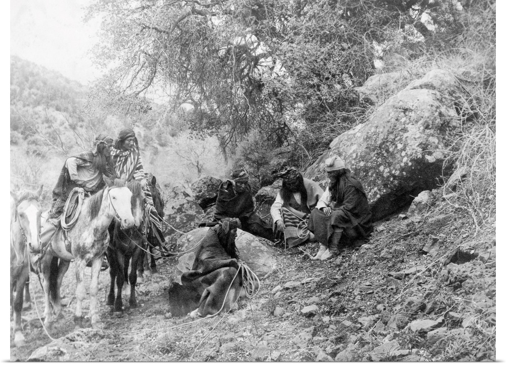 Apache Men, c1906. 'Storytelling.' An Apache Man Marks the Ground With A Stick While Others Look On. Photograph By Edward ...