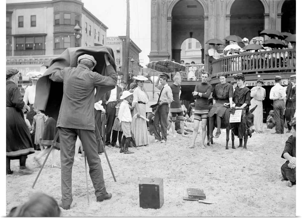 Atlantic City, Beach. A Photographer On A Crowded Beach Taking A Picture Of A Group Of three People With A Donkey (Includi...