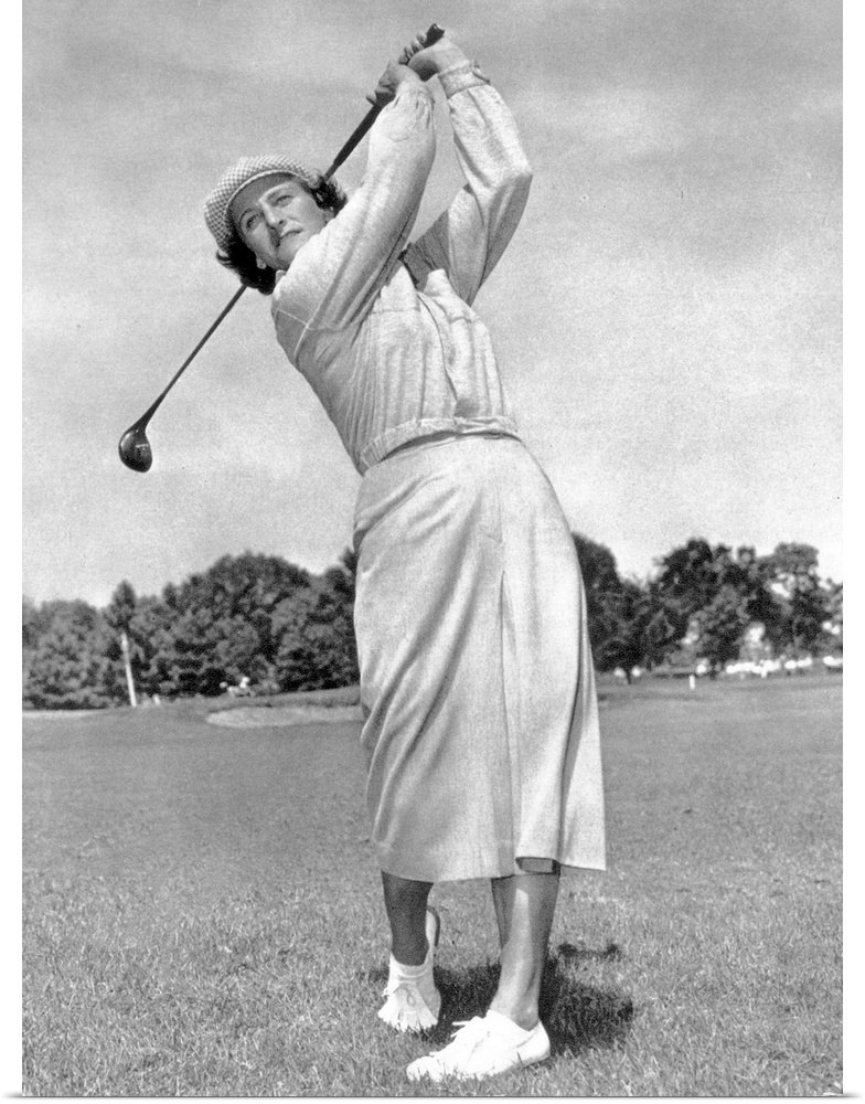 (1911-1956). Ne Mildred Ella Didrikson. American athlete. Photographed while swinging a golf club, c1950.