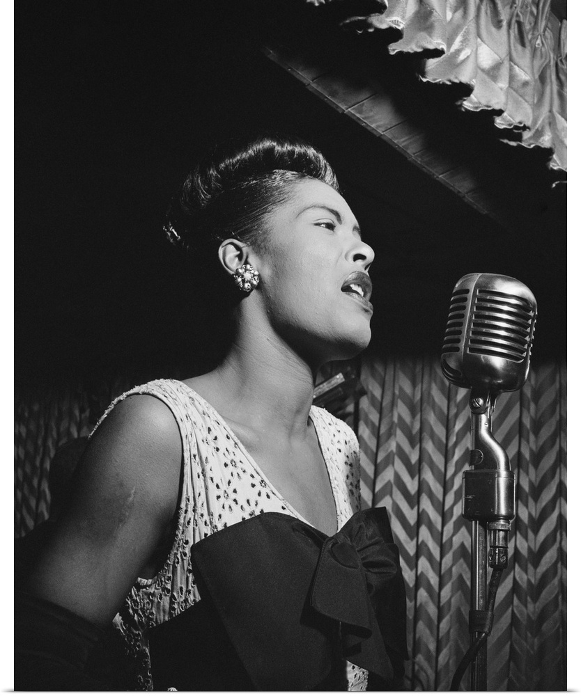 American singer. Performing at Downbeat in New York City. Photograph by William P. Gottlieb, c1947.