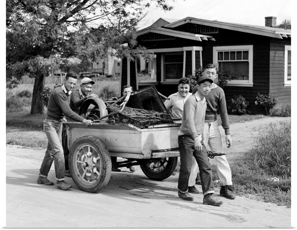 Boys collecting scrap metal for the war effort in San Juan Bautista, California. Photograph by Russell Lee, 1942.