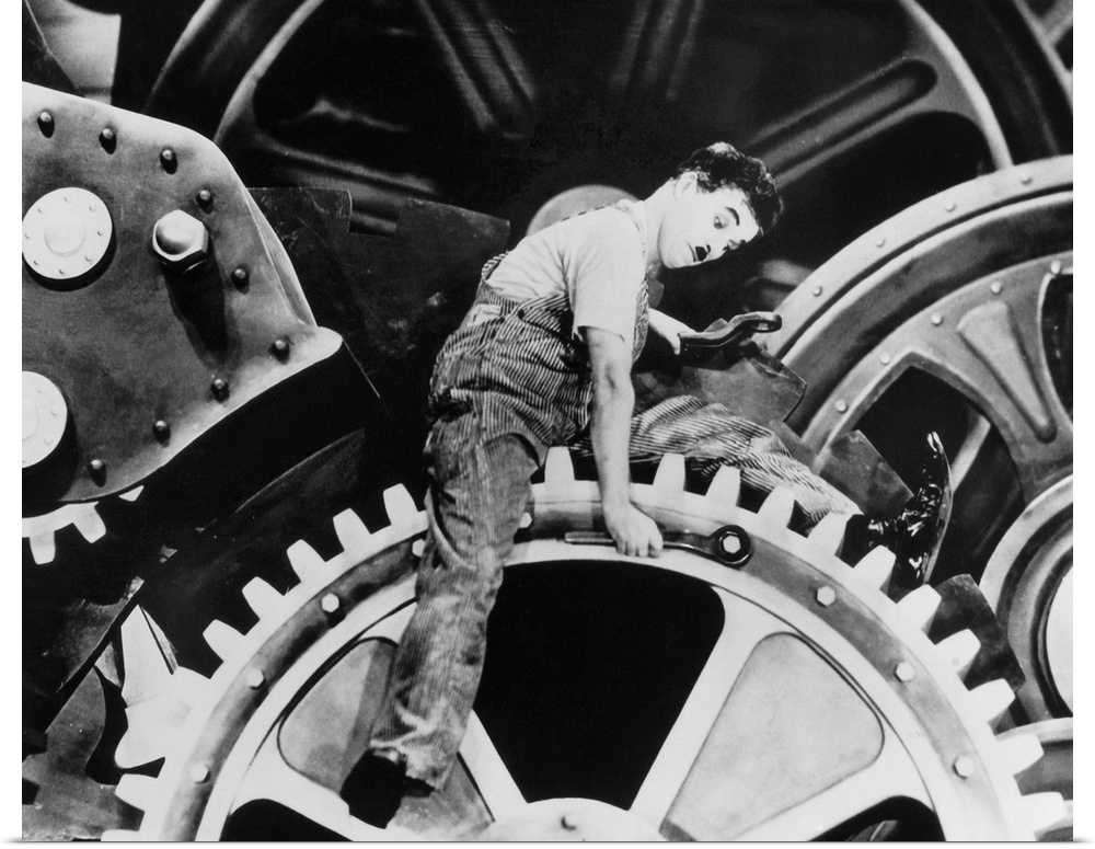 Charlie Chaplin in a scene from the film 'Modern Times,' 1936.