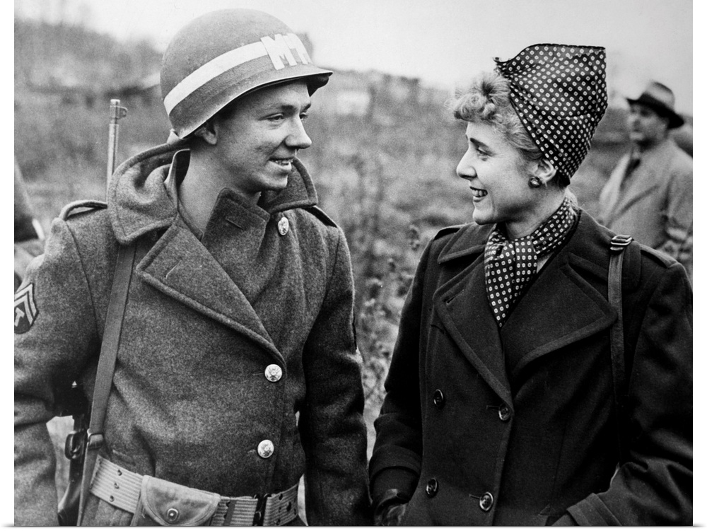 American playwright, socialite and Congresswoman. Interviewing an American military policeman on the 3rd Army Front in Eur...