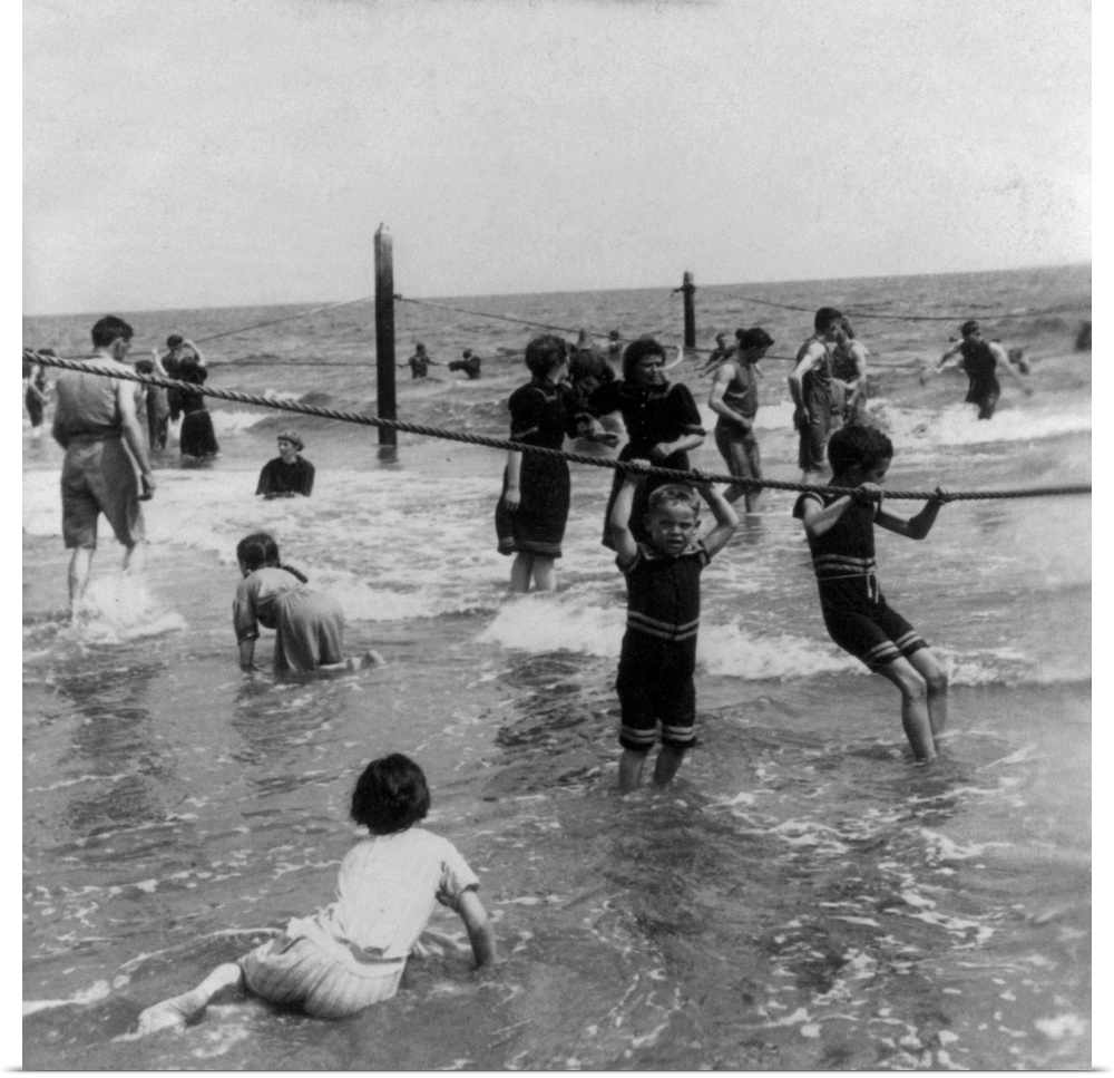 Children playing in surf at Coney Island, Brooklyn, New York. Stereograph, c1897.