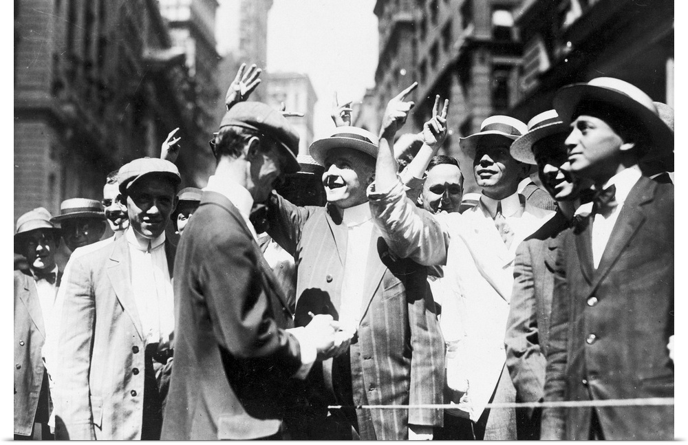 Stock brokers trading on the New York Curb Association market, with brokers and clients signaling from street to offices. ...