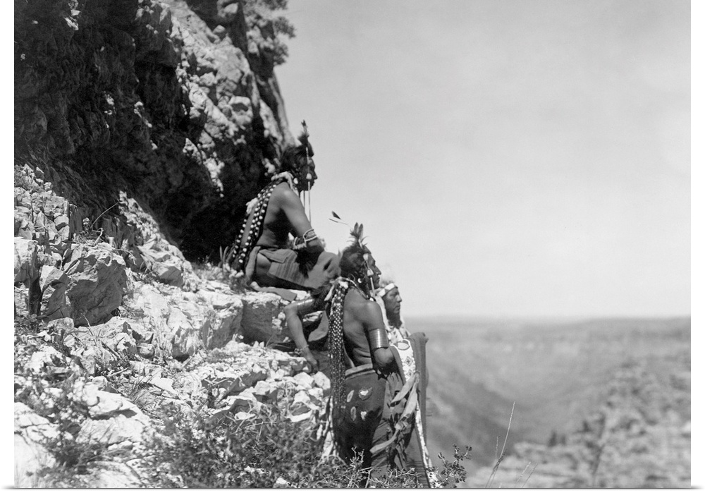 Curtis, Crow Men, C1905. three Crow Native Americans Standing On the Edge Of A Cliff In Montana. Photograph By Edward Curt...