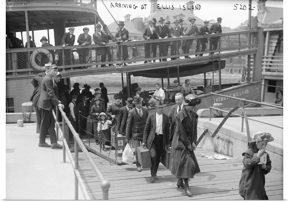 Women and children arriving at Ellis Island with their belongings, c1900.