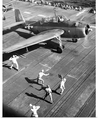Flight deck crew on board the USS Bunker Hill aircraft carrier, 1944