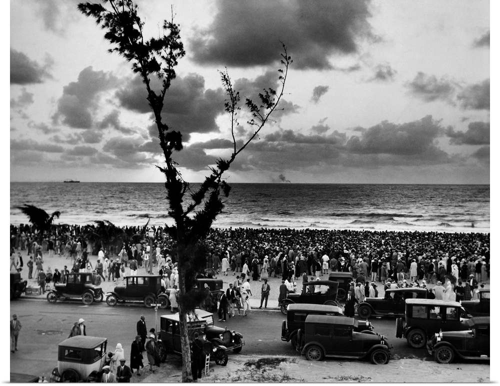People gather at sunrise at Miami Beach, Florida, 1927. Photograph likely taken on 17 April 1927, when thousands of people...