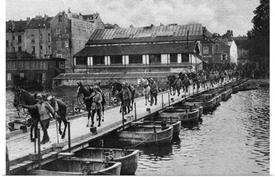 French cavalrymen leading their horses over a pontoon bridge, World War I