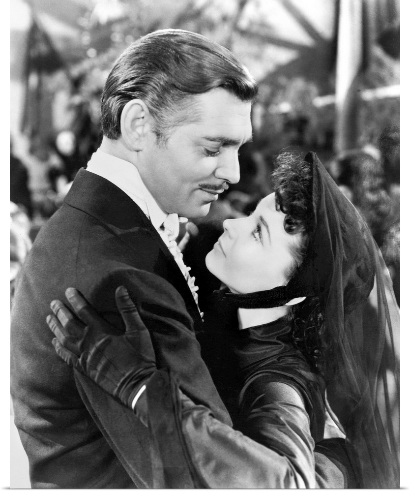 Vivien Leigh as Scarlett O'Hara and Clark Gable as Rhett Butler in the film 'Gone with the Wind' directed by Victor Flemin...