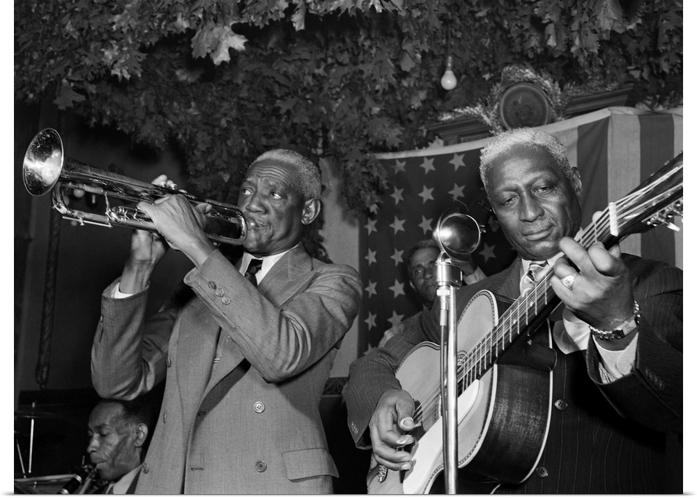(1889-1949). Known as 'Lead Belly'. American folk musician. Performing with Bunk Johnson at the Stuyvesant Casino in New Y...