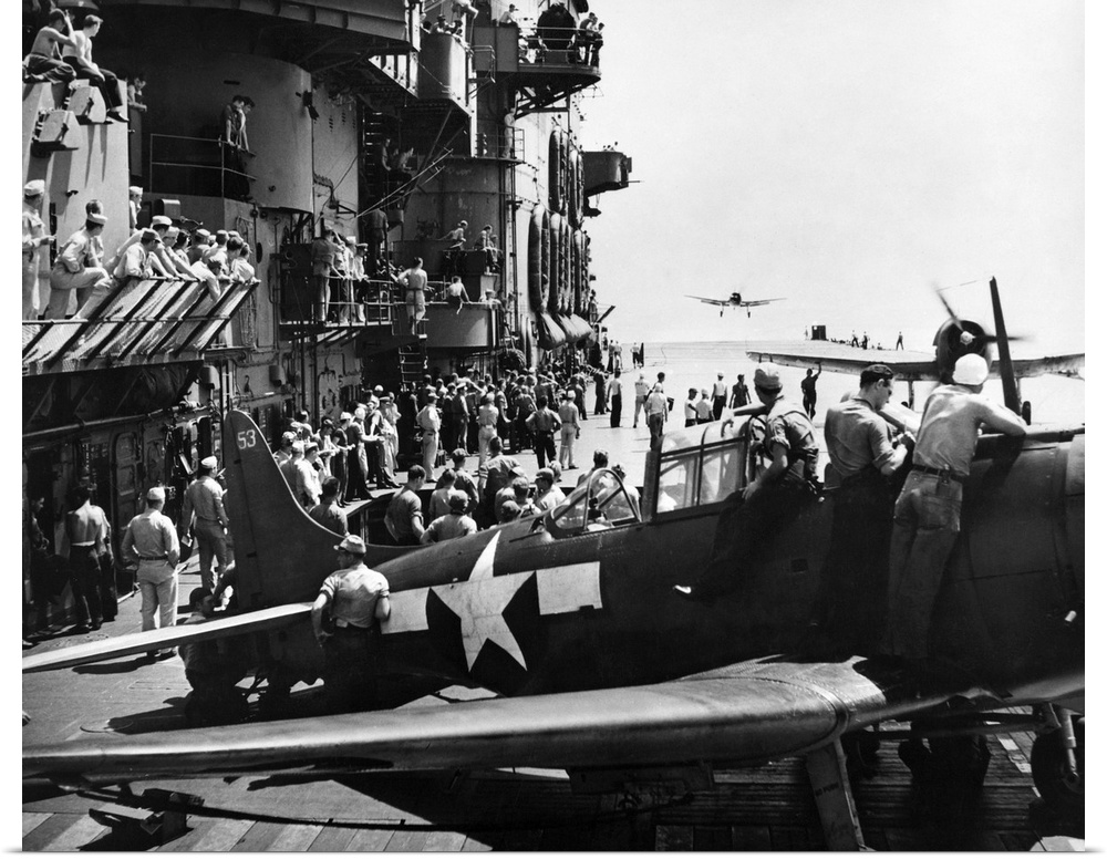Inspection of returning planes on board the USS Saratoga during from the raid on Papua New Guinea, 5 November 1943.