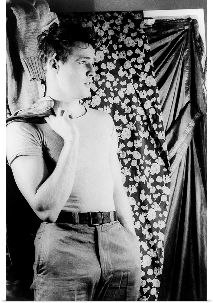 American actor. Photographed by Carl Van Vechten as the character of Stanley Kowalski in 'A Streetcar Named Desire,' 1948.