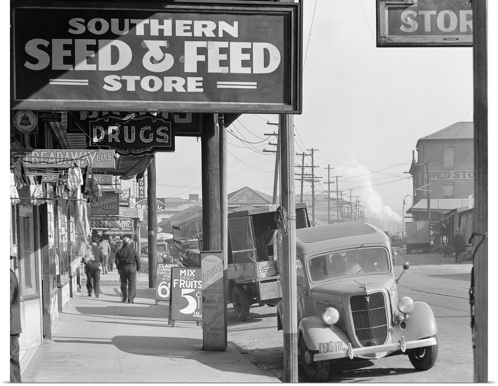 A French market street scene at the waterfront in New Orleans, Louisiana. Photograph by Walker Evans in December 1935.