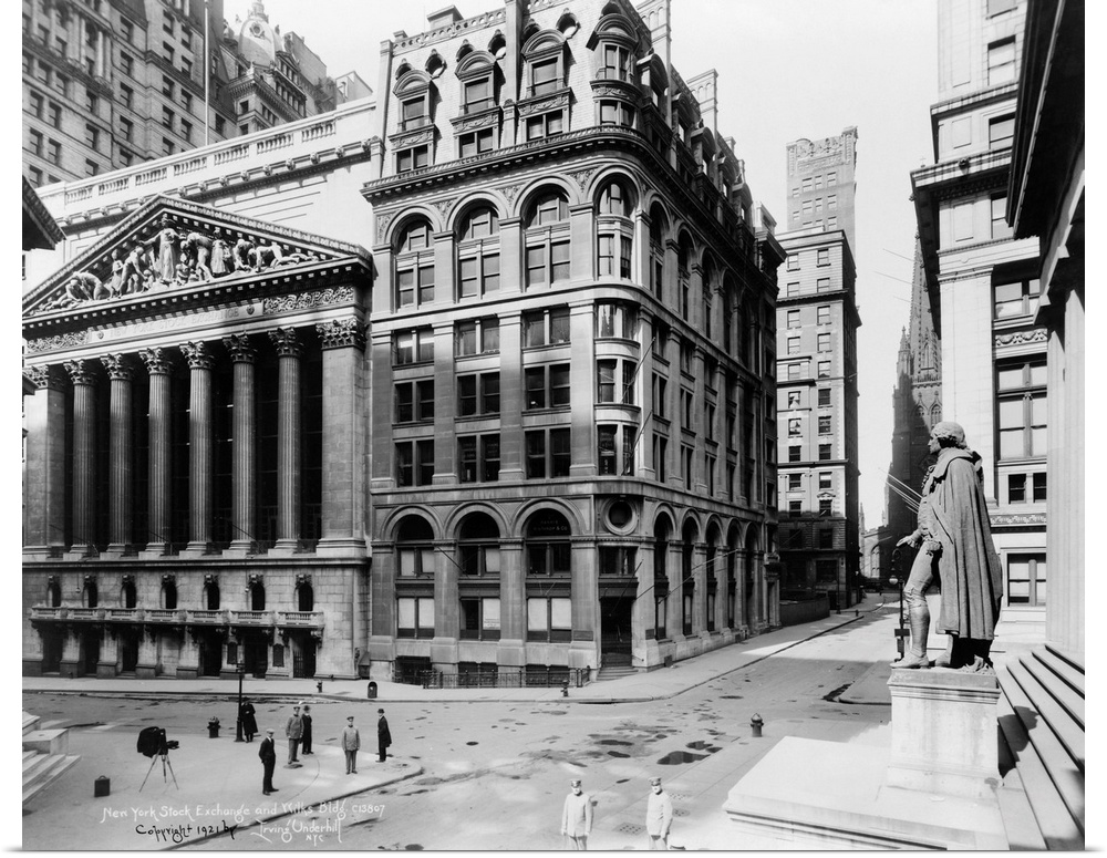 View of the New York Stock Exchange and Wilks Building on Wall Street in New York City. Photograph, c1920.