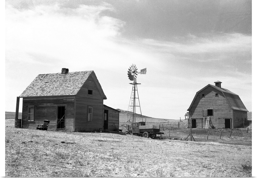 A farmhouse in a drought area at Beach, North Dakota. Photograph by Arthur Rothstein, July 1936.