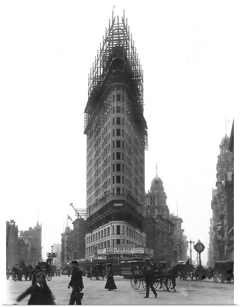 The Flatiron Building under construction in 1902.