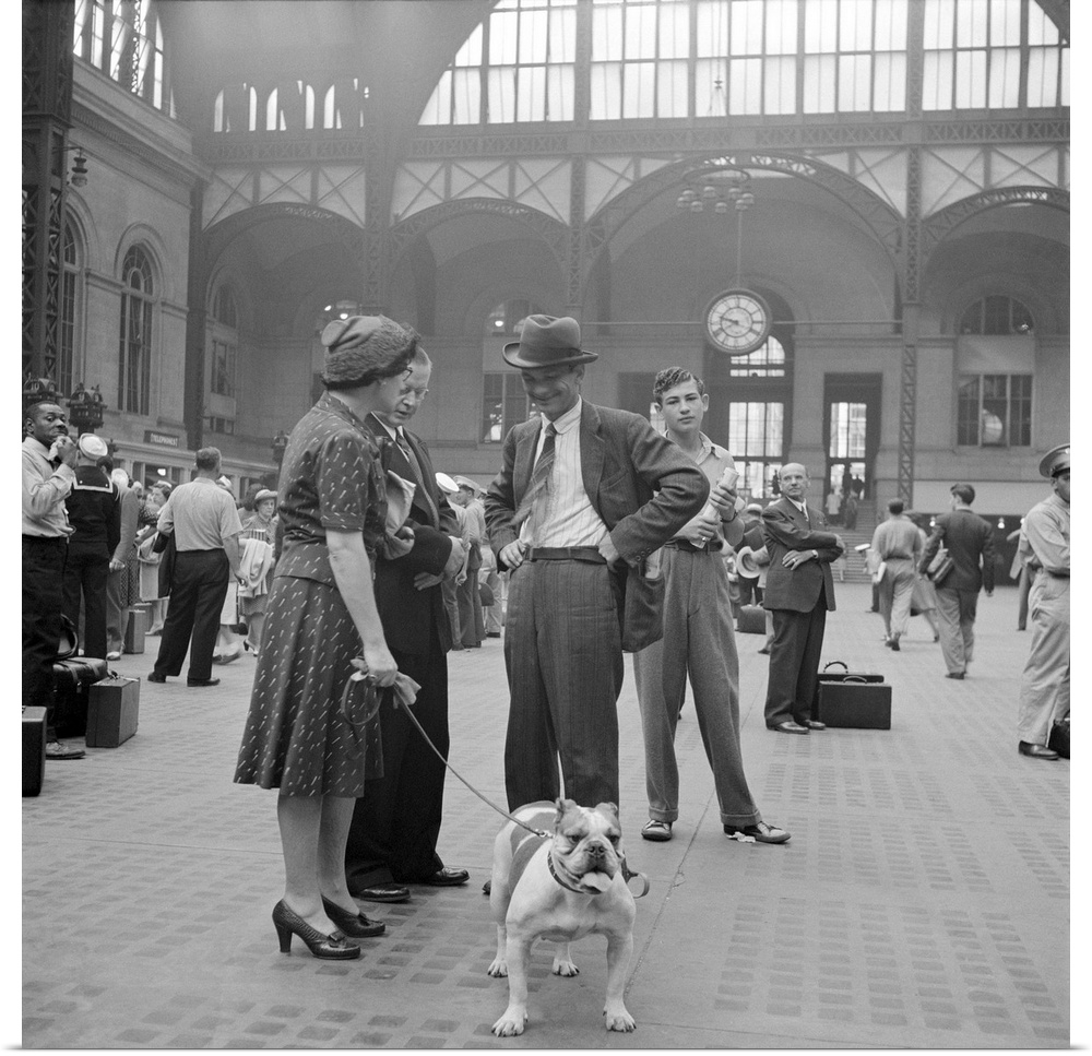 Passengers waiting for their train at Penn Station in New York City. Photograph by Marjory Collins, 1942.