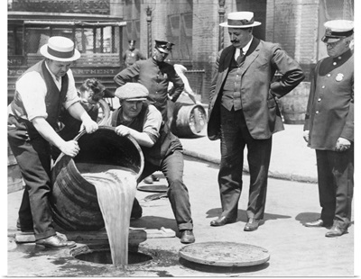 Prohibition, C.1921, agents pour liquor into a sewer