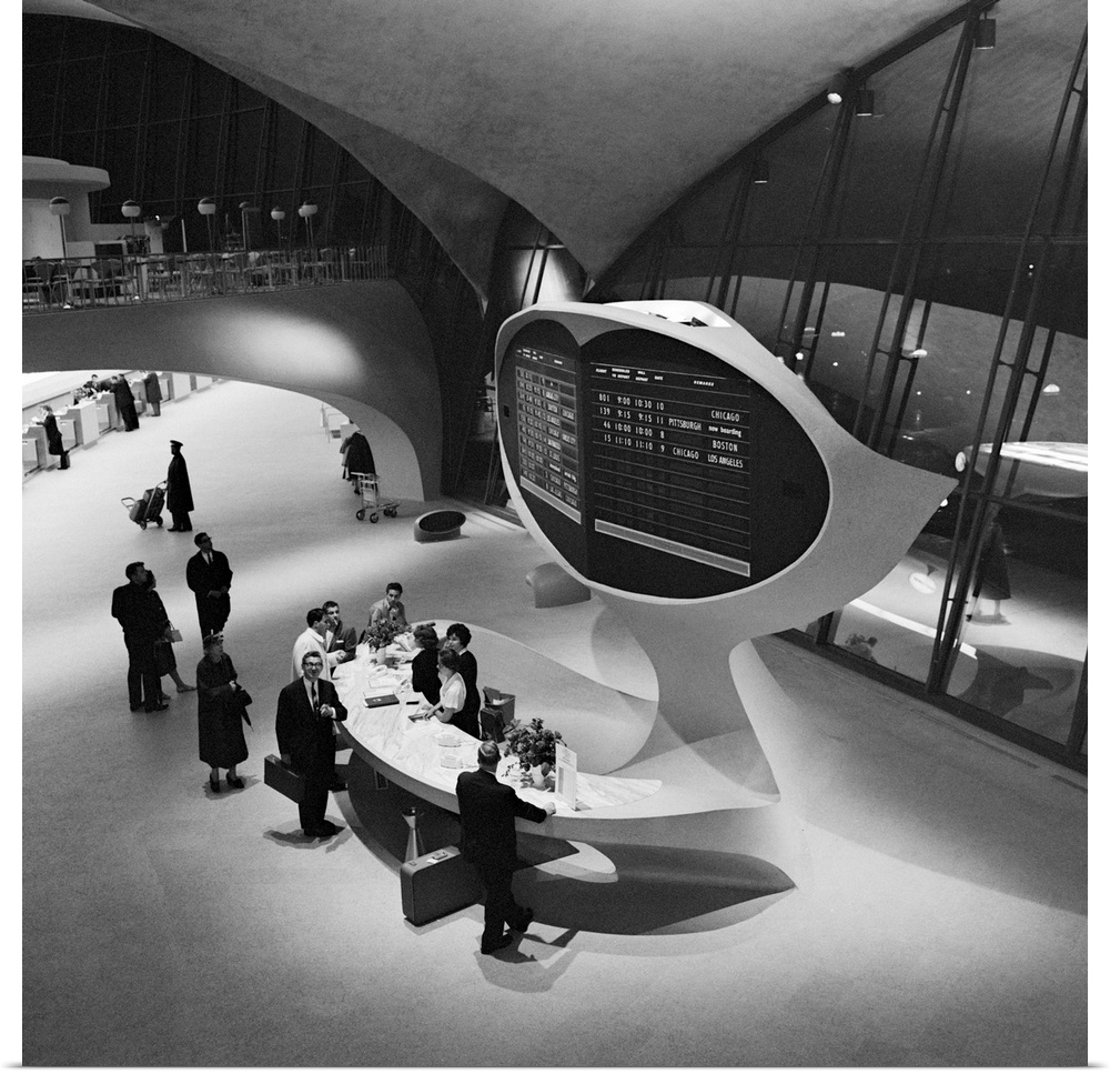The information desk in the Trans World Airlines Terminal at Idlewild (now JFK) Airport in New York, New York. Photograph ...