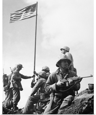 The raising of the first flag on Mount Suribachi, Iwo Jima, 1945