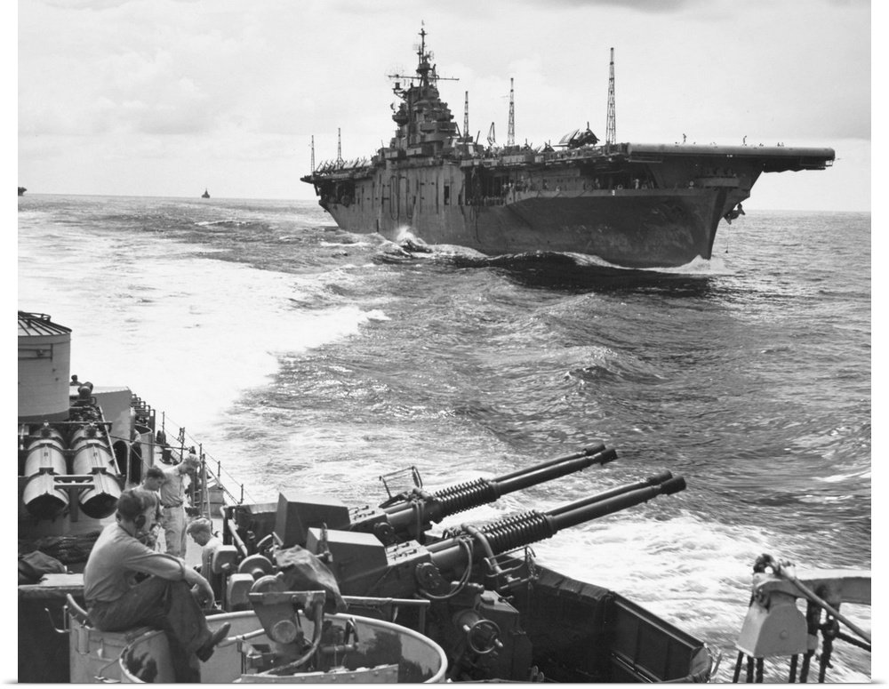 The USS Essex aircraft carrier as seen from the USS Ault, off the coast of Japan, July 1943.