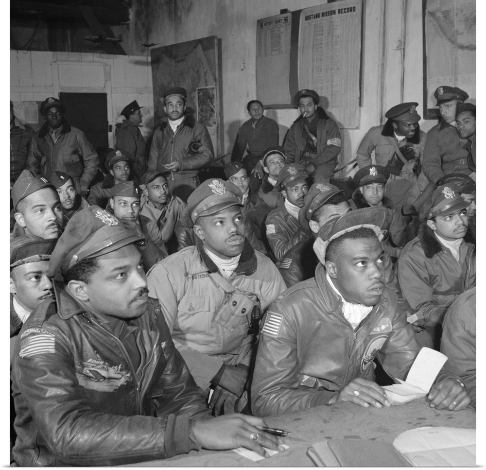 Tuskegee Airmen at a briefing at Ramitelli Airfield, Italy. Photograph by Toni Frissell, March 1945.
