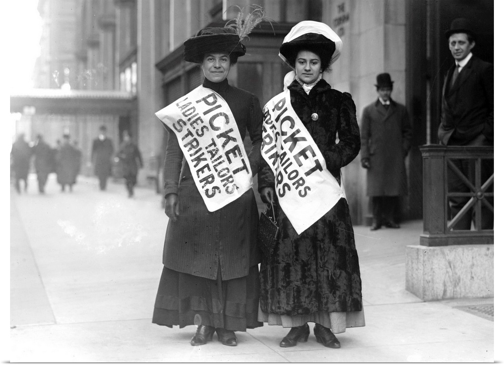 Two garment workers on a picket line during a garment worker strike in New York City, 1910.