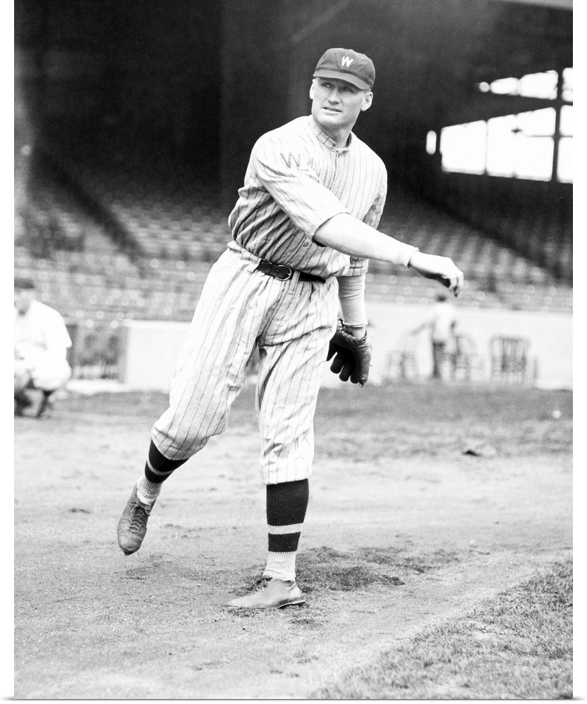 (1887-1946). American baseball player. Pitching in 1924.