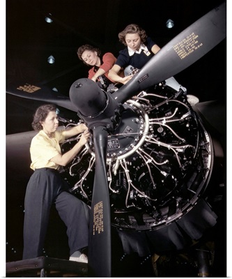 Women installing an aircraft engine at the Douglas Aircraft plant, Long Beach, CA, 1942