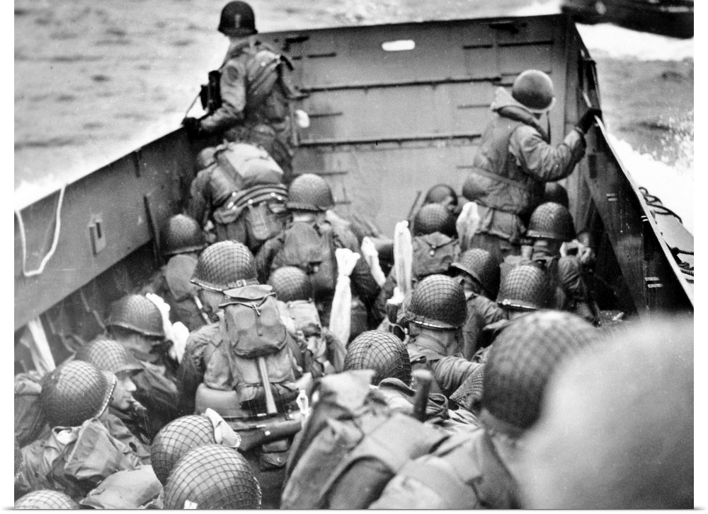 U.S. Army assault troops aboard the Coast Guard landing craft off the coast of Normandy, France, 6 June 1944.