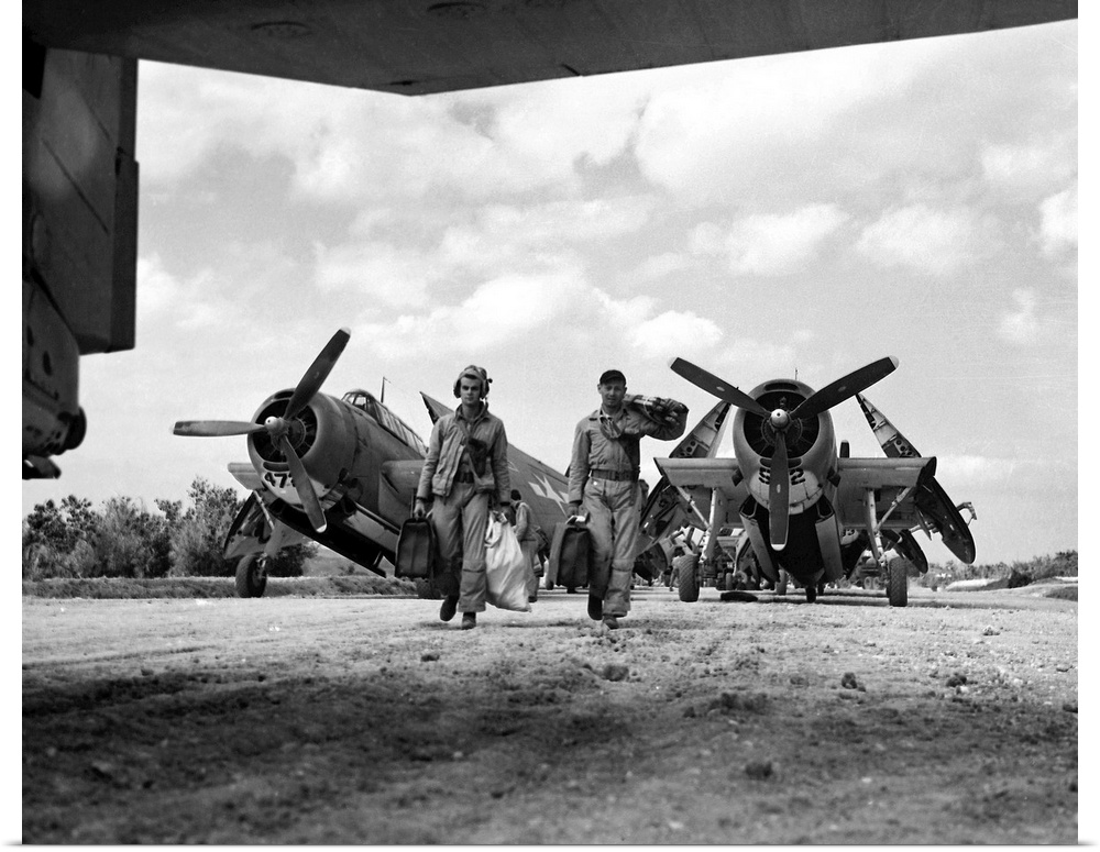 Two pilots of the U.S. Second Marines Air Wing 'Red Devils' torpedo bomber squadron at Kadona Airfield, Okinawa, Japan. Ph...