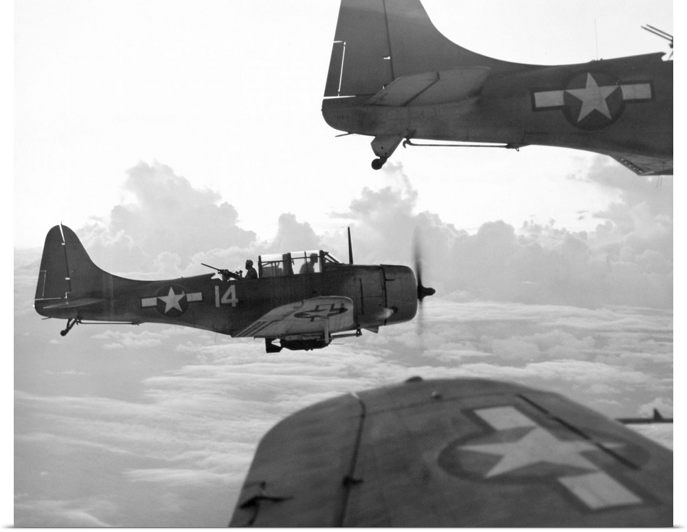 U.S. Navy Douglas Dauntless dive bombers en route to a strike at a Japanese base in the Pacific.