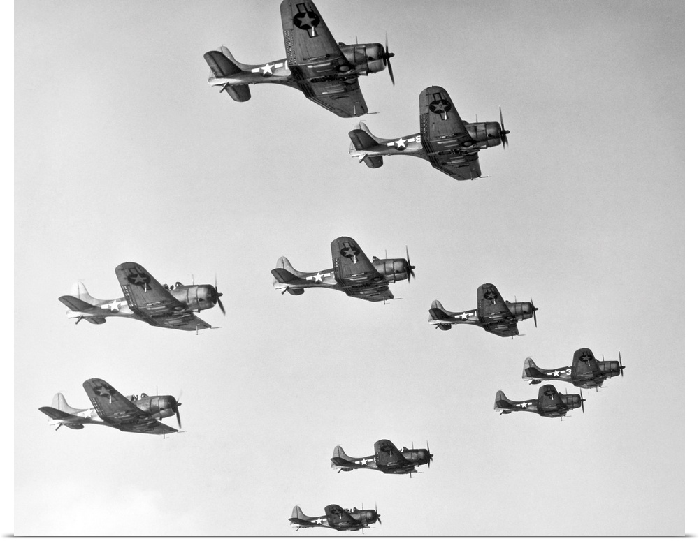 A victory formation of U.S. Douglas Dauntless Dive Bombers. U.S. Douglas Dauntless Dive Bombers were used at the battles o...