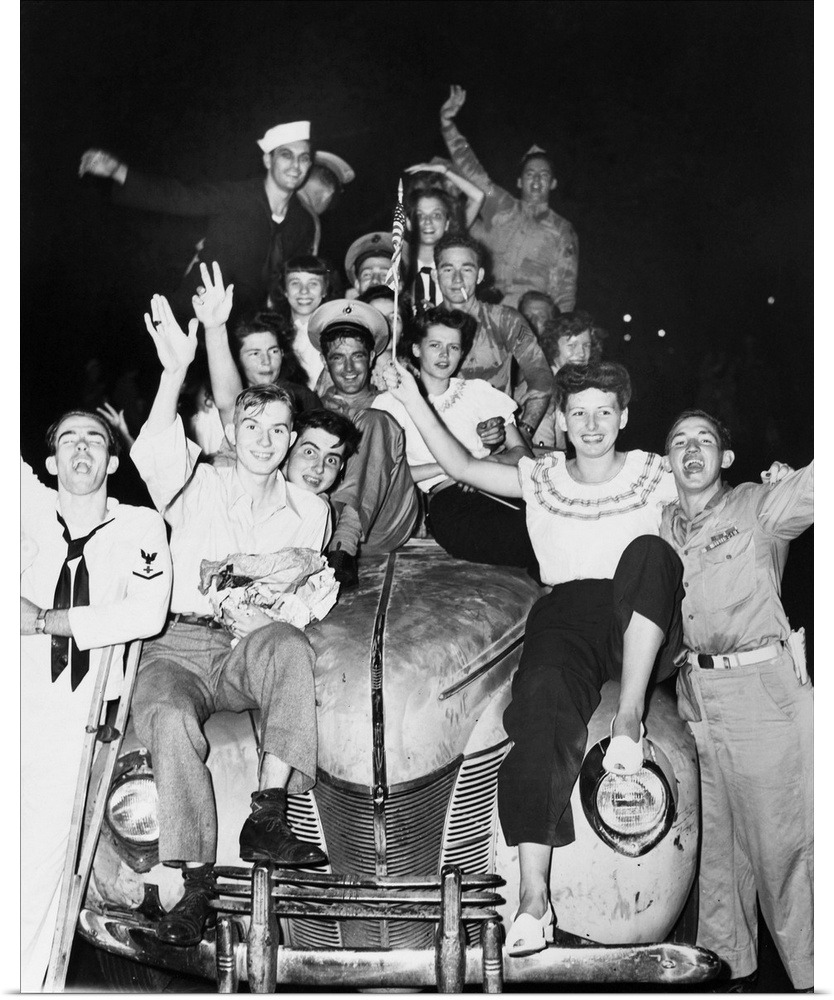 A group of people in Washington D.C. celebrating the Japanese surrender to Allied forces. Photograph, 14 August 1945.