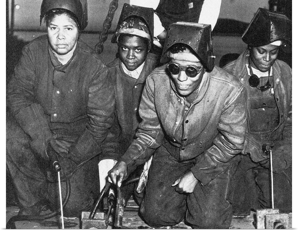 Women welders at a shipyard in Richmond, California, at work on the construction of the Liberty ship S.S. George Washingto...