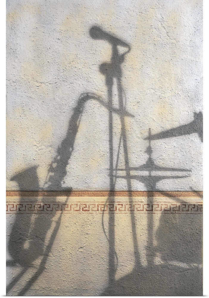 Contemporary painting of instruments and band equipment casting shadows on a wall.