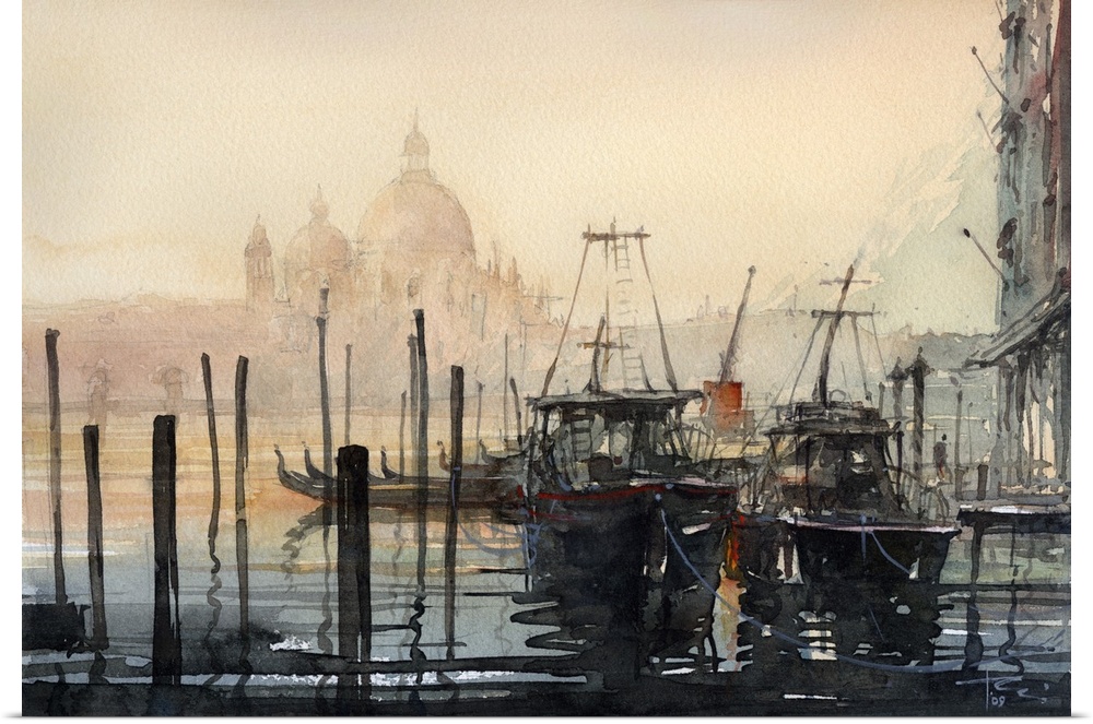 Heavy shadows and reflective water create boats in Venice with the Santa Maria della Salute Cathedral in the background.