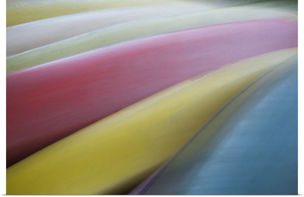 Abstract image of pastel colored canoes on Madeline Island, Wisconsin.