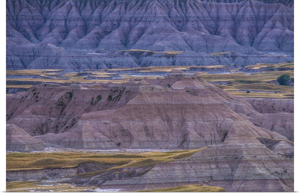 Sedimentary rock layers visible in the eroded landscape of Badlands National Park, South Dakota.
