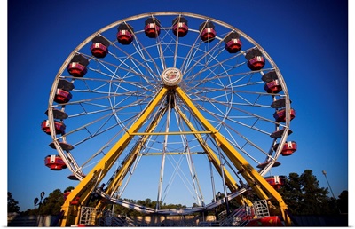 A colorful Ferris Wheel at the North Carolina State Fair in Raleigh, NC