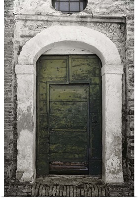 A green door Penne, a comune in the province of Pescara, Italy