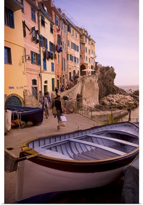 A rowboat is pulled out of the water in La Spezia, Italy