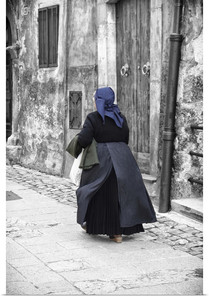A women in traditional costume in Scanno, situated in the Sagittario Valley and encircled by the Majella mountains, Abruzz...