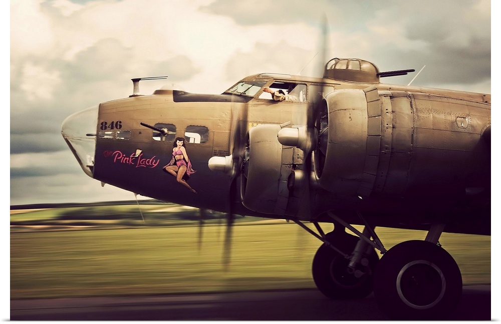 A  B-17G Flying Fortress bomber on takeoff.