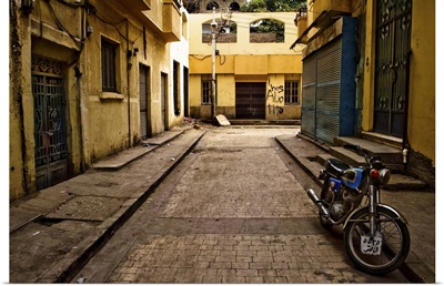 Back street of Luxor Town, Egypt with motorbike